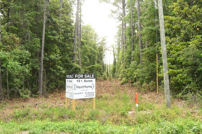 Property at 5326 Masonboro Loop Rd Monday May 23, 2022 is up for sale. A developer is proposing 84 new townhomes off of Masonboro Loop Road in Monkey Junction but members of the surrounding neighborhood are "vehemently" opposed. [KEN BLEVINS/STARNEWS]   