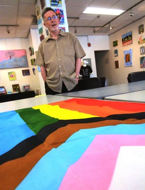 Paul J. Doyle, pastor of Park Congregational Church in Norwich, supports raising the LGBTQ+ flag at Norwich City Hall.