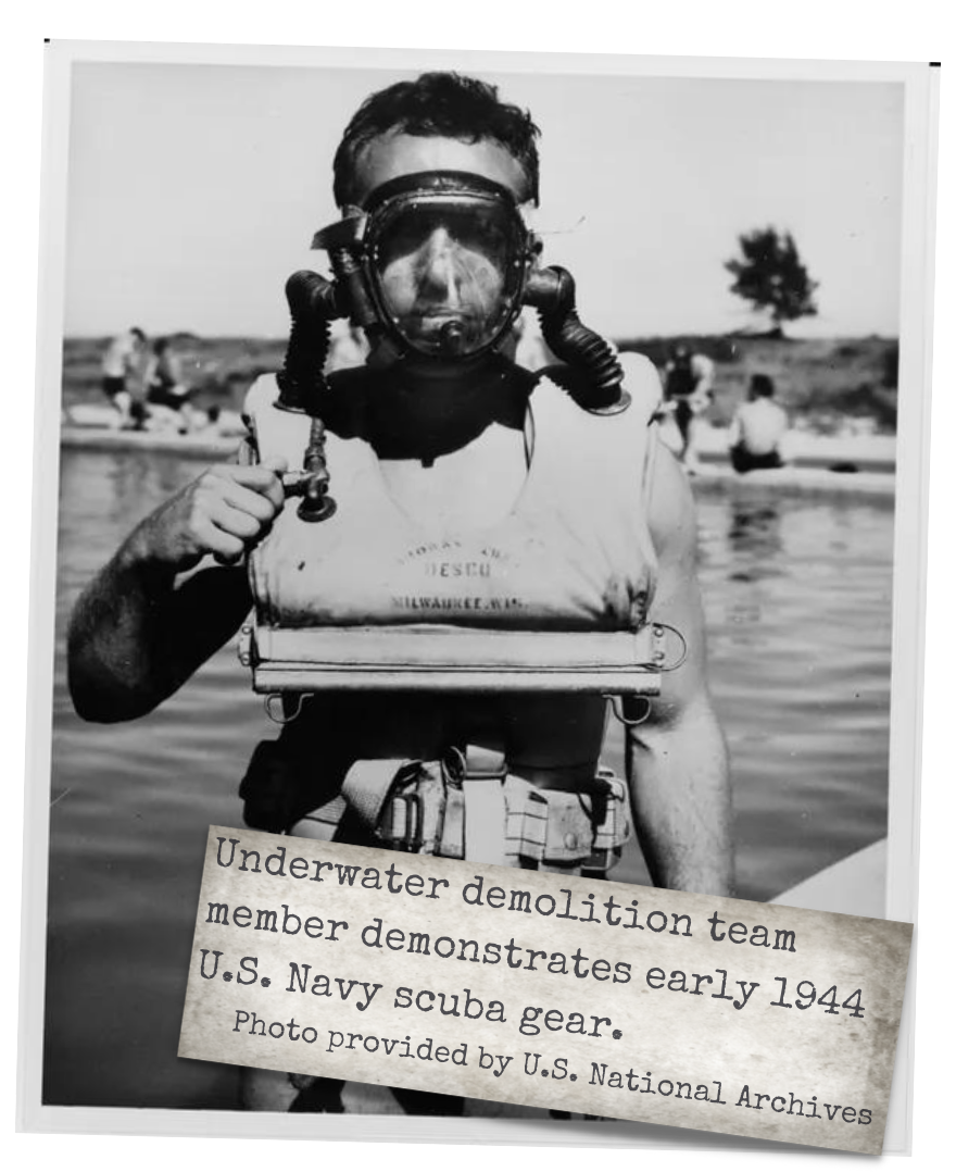 Underwater demolition team member demonstrates early 1944 U.S. Navy scuba gear.