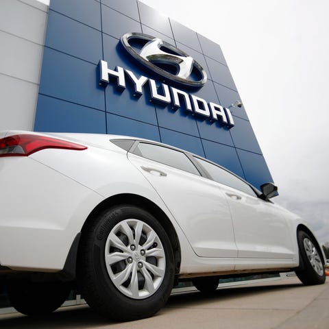 An unsold 2019 Accent sedan sits at a Hyundai deal