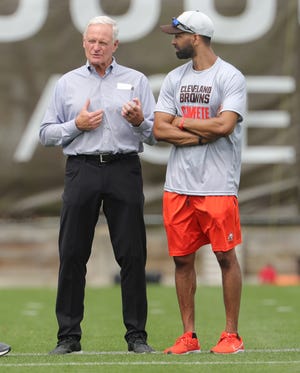 Browns owner Jimmy Haslam and GM Andrew Berry talk during practice, Wednesday, May 25, 2022, in Berea.