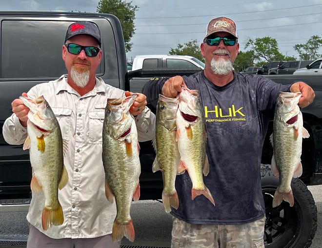 Keith Katrien, left, and Mark Kummelman had 20.25 pounds and big bass with a 6.20 pounder to win the Bass Bandits of Brandon tournament May 21 on the Winter Haven Chain. PROVIDED BY LINDSEY ENGLISH