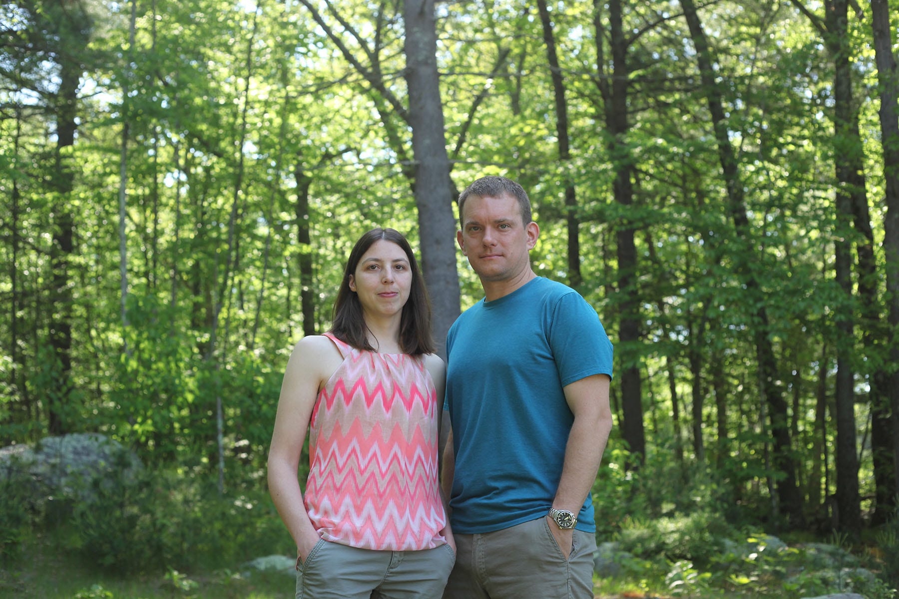 Bonnie and Chris Dibble on their Johnston property, which is 200 feet from the edge of Green Development's solar farm.  