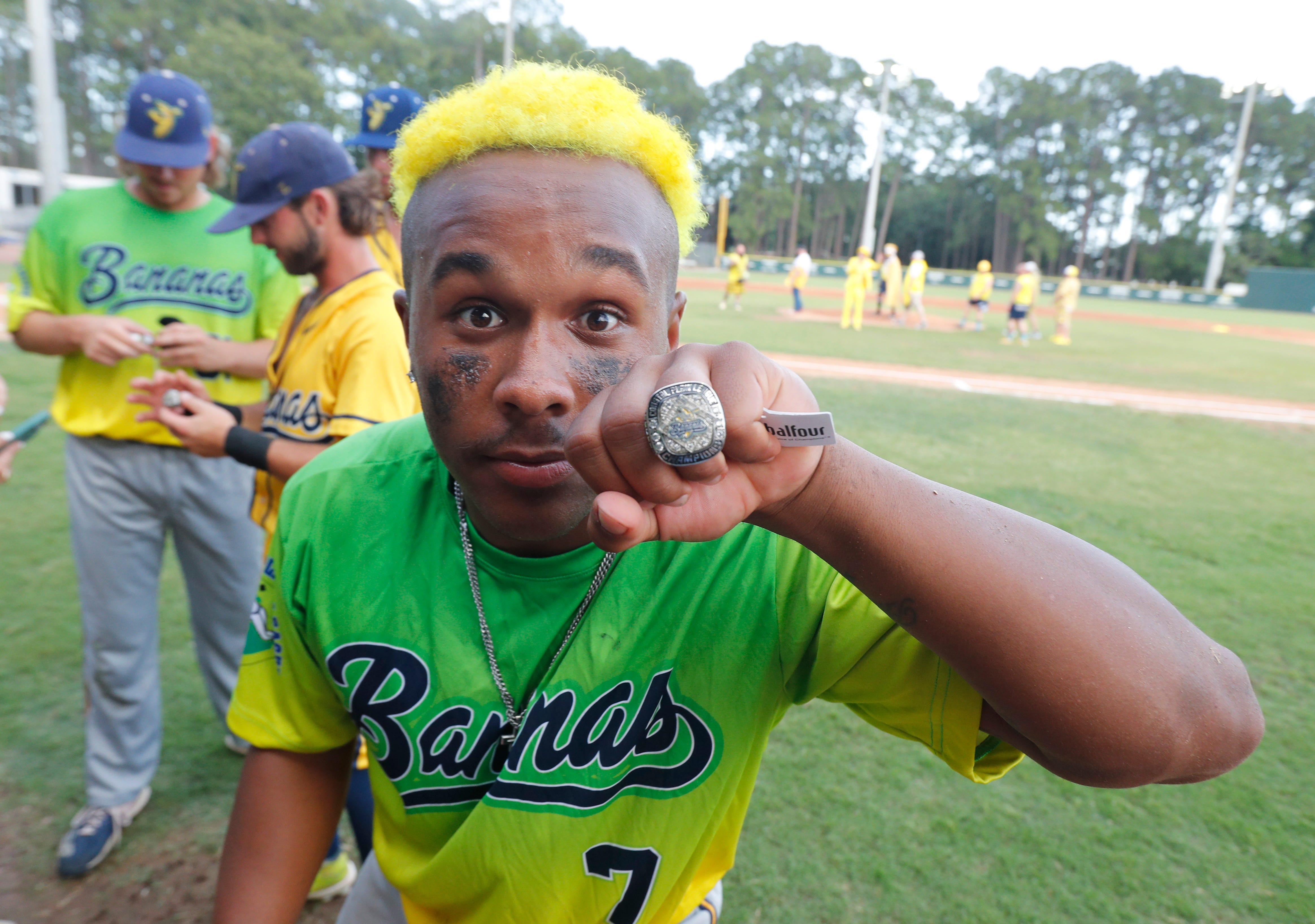 Savannah Bananas center fielder Ty Jackson shows off his Coastal Plains League championship ring from last season.