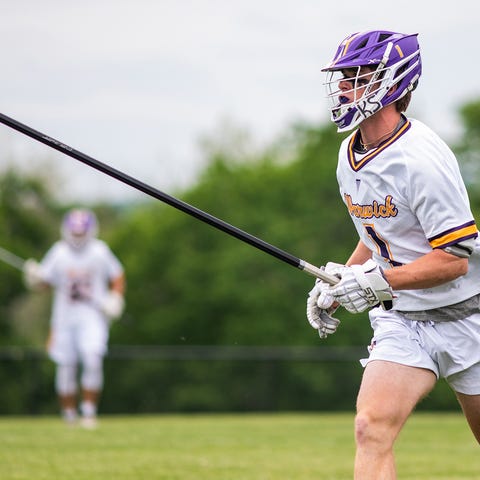 Warwick's Fracis Keneally drives up field during t