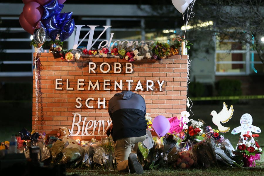 Kyev Tatum, pastor from New Mount Rose Missionary Baptist in Fort Worth, visits the memorial at Robb Elementary School Wednesday, May 25, 2022, in Uvalde. At least 19 students and two adults died in a shooting at a Robb elementary school Tuesday, marking the deadliest school shooting in the state's history.