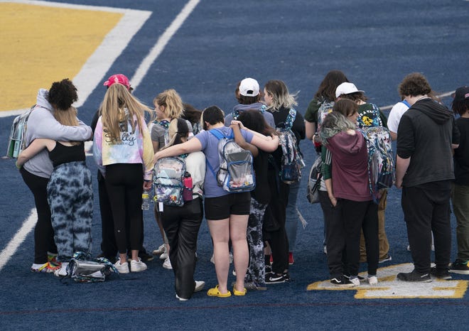 Oxford High School students walked out of classes, Thursday, May 26, in Oxford, Mich., to show their support for the Uvalde community after the mass shooting there.