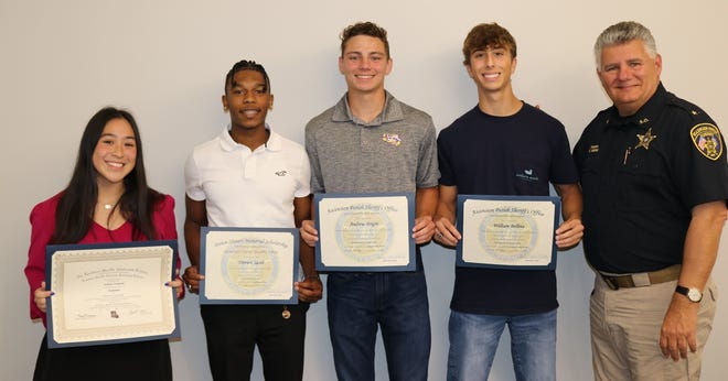 Milain Li Marcel, Trevion Jacobs, Andrew Bright, and William Bellina received scholarships.