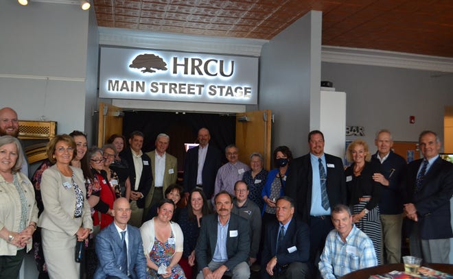 Board members, employees, and community members in attendance at the dedication of the HRCU Main Street Stage at the Rochester Performance & Arts Center.