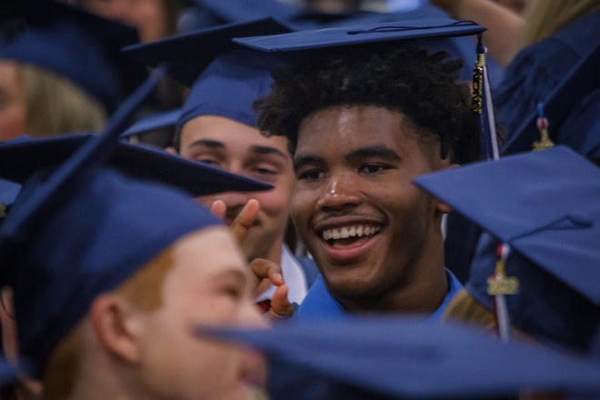 William T. Dwyer High School's 2022 graduating class prepares for their ceremony at the South Florida Fairgrounds and Expo Center in unincorporated Palm Beach County, Fla., on Thursday, May 26, 2022.