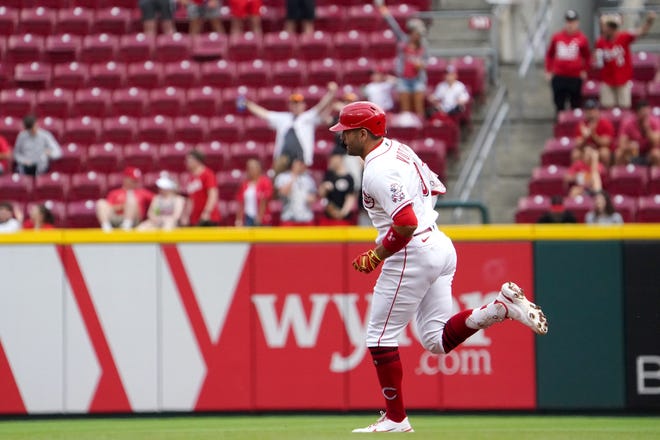 Cincinnati Reds first baseman Joey Votto (19) rounds the bases after hitting a solo home run in the second inning during a baseball game against the Chicago Cubs, Wednesday, May 25, 2022, at Great American Ball Park in Cincinnati. 