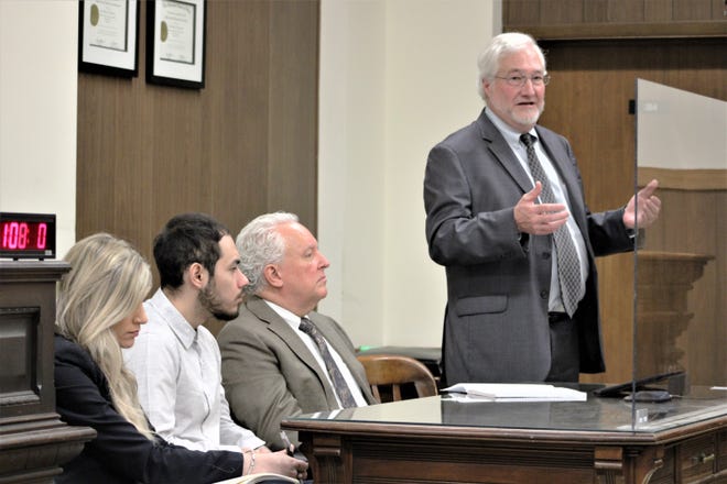 Attorney Gregory W. Meyers, standing, addresses the court during a pre-trial hearing for defendant Christian Gutierrez, seated second from left, on Thursday, May 26, 2022, in Marion County Common Pleas Court. Gutierrez is facing a capital murder trial after being accused of shooting and killing Charles Feliciano on Wednesday, March 9, 2022. Also pictured are attorneys Kandra Roberts, left, and Kirk A. McVay, third from left.