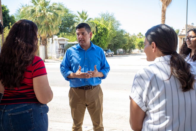 U.S. Rep. Raul Ruiz, D-La Quinta, and U.S. EPA Region 9 administrator Martha Guzman, right, meet with east Coachella Valley mobile home park resident Magdalena Arroyo in Thermal, Calif., on Wednesday, May 25, 2022. 