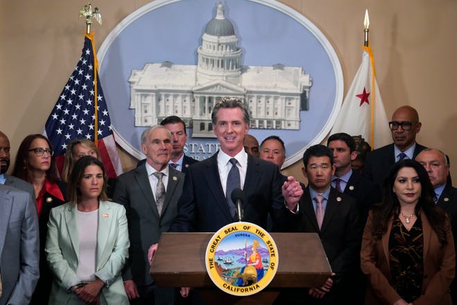 California Gov. Gavin Newsom discusses the recent mass shooting in Texas, during a news conference in Sacramento, Calif., Wednesday, May 25.