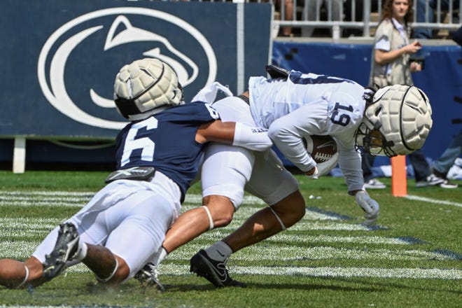 Penn State defensive back Zakee Wheatley, seen here at left making a tackle in the Blue-White spring game, may be a breakout star this fall.