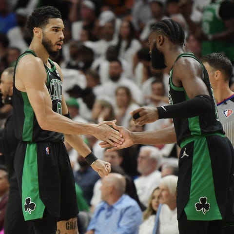 Jayson Tatum (0) and Jaylen Brown (7) combined for