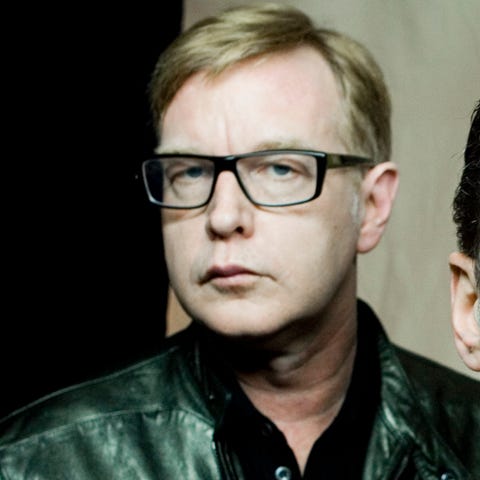 Depeche Mode members Andy Fletcher, left, David Ga