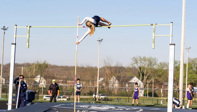 Twinsburg's Jessica Mason clears the bar during a meet earlier this month. Mason recently set a new school record with a pole vault of 10 feet, 8 inches.
