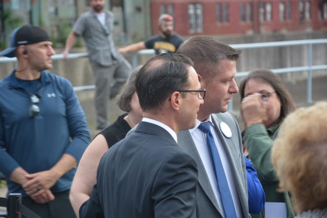 Pennsylvania Attorney General Josh Shapiro, left, takes a photo with Somerset County resident Justyn Patton during a campaign stop on May 26, 2022, in Johnstown.