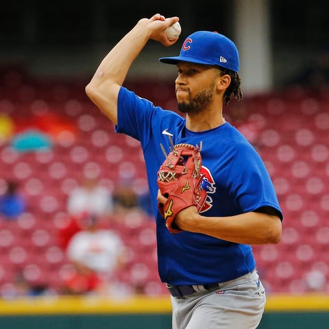 Chicago Cubs shortstop Andrelton Simmons  comes in