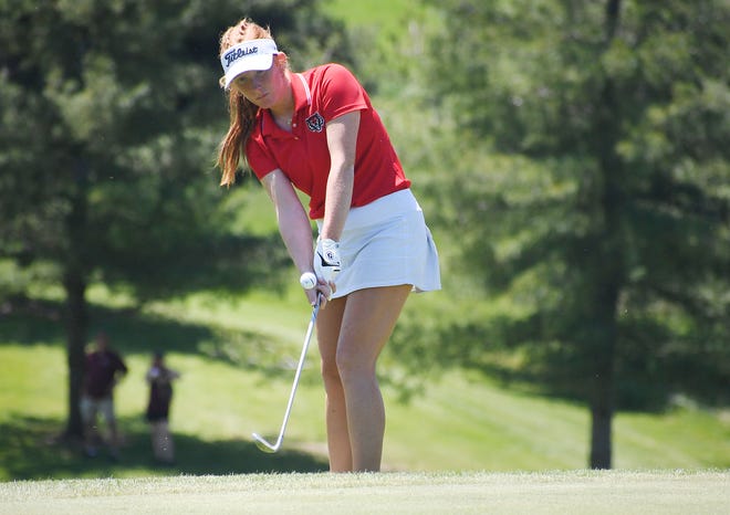 ADM's Monica Thomas chips the ball from the rough onto the 18th hole in the Class 3A girls' State Golf final round at River Valley Golf Course Friday, May 27, 2022, in Adel, Iowa.