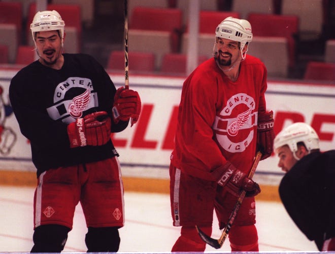Detroit Red Wings' Jamie Pushor, left, and Brendan Shanahan laugh near the end of practice at Joe Louis Arena, May 28, 1997.