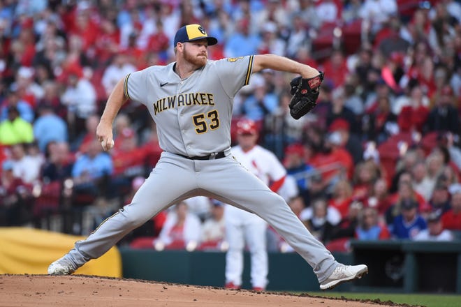 Milwaukee Brewers starting pitcher Brandon Woodruff had to leave before the start of the fifth with right ankle discomfort.