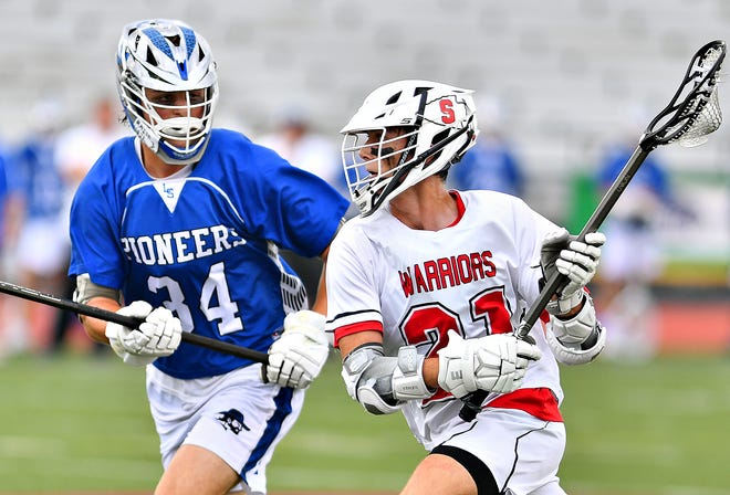 Susquehannock's Jake Wetzel, right, controls the ball while Lampeter-Strasburg's Drexton Frank defends during PIAA District III, Class 2-A boys' lacrosse championship action at Central Dauphin Middle School in Harrisburg, Friday, May 27, 2022. Susquehannock would win the game 11-9, making history as the first York-Adams team to win the title. Dawn J. Sagert photo