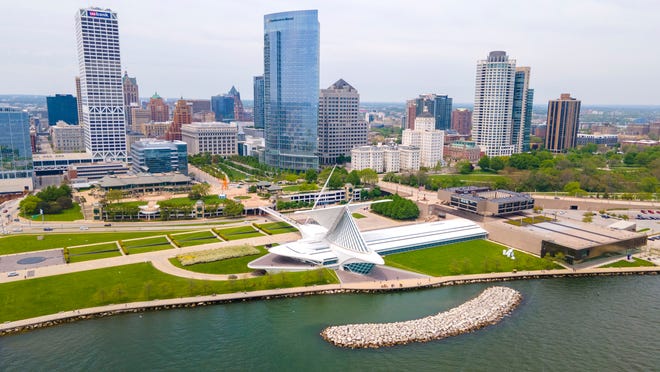 The Milwaukee downtown skyline along Lake Michigan is seen with the Milwaukee Art Museum, the US Bank building, and the Northwest Mutual tower in Milwaukee.