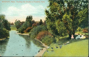 Here is an old postcard showing a group of girls feeding the ducks on the bank of a stream in Franklin Park. Learn more from Digital Commonwealth at www.digitalcommonwealth.org.