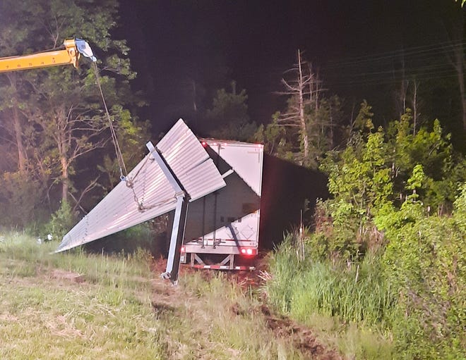 A tractor-trailer went off Interstate 95 in Greenland after a crash involving a sedan around 11:30 p.m. Monday, May 30, 2022, according to New Hampshire State Police.