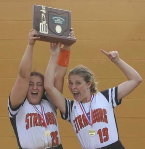 Strasburg's Sydney Sibila and Amelia Spidell celebrate the Tigers Division IV regional softball title in 2022.