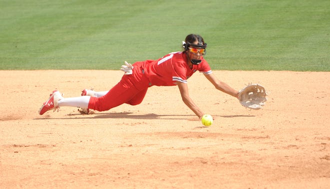 Hermleigh's Juli Munoz dives for a grounder in the state semifinals against Chireno on Tuesday.