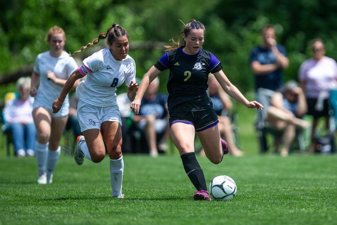 Norwalk's Anna Larson kicks the ball during a Class 2A state soccer quarterfinal May 31 in Des Moines.