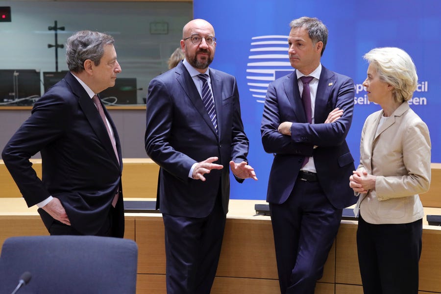 From left: Italian Premier Mario Draghi, European Council President Charles Michel, Belgium's Prime Minister Alexander de Croo and European Commission President Ursula von der Leyen talk before the second day's session of an extraordinary meeting of EU leaders to discuss Ukraine, energy and food security at the Europa building in Brussels, Tuesday, May 31, 2022.