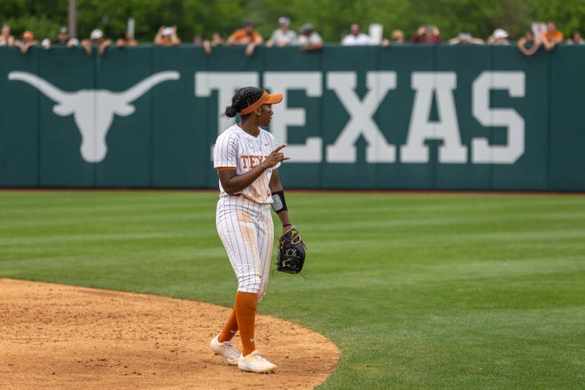Texas second baseman Janae Jefferson celebrates two Oklahoma outs in the 7th inning during an NCAA softball game in Austin, Saturday, Apr., 16, 2022.