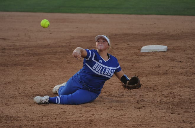 Stamford's Macy Detamore throws to first base after making a diving stop at second against Lovelady in the state semifinals on Tuesday.