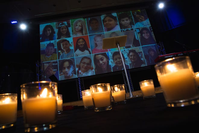 During the alert on Tuesday, May 31, 2022, the candles shine as a picture of the victims of the Yuvalde shooting appears on the back screen. Community members attended the NAACP event to mourn the lost lives in Buffalo and Yuvalde and call for action. ..