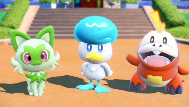 The starter Pokémon for "Pokemon: Scarlet" and "Pokemon: Violet" (from left to right): Sprigatito, Quaxly and Fuecoco.