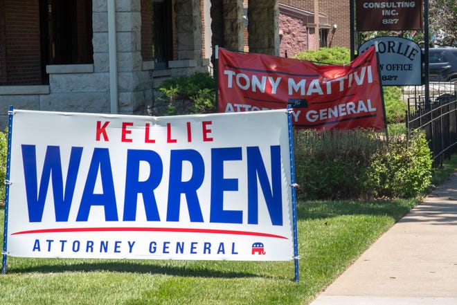 Campaign signs for Sen. Kellie Warren, R-Leawood, and Tony Mattivi, who are vying the Republican nomination for Kansas attorney general, are seen Thursday along S.W. Topeka Boulevard.