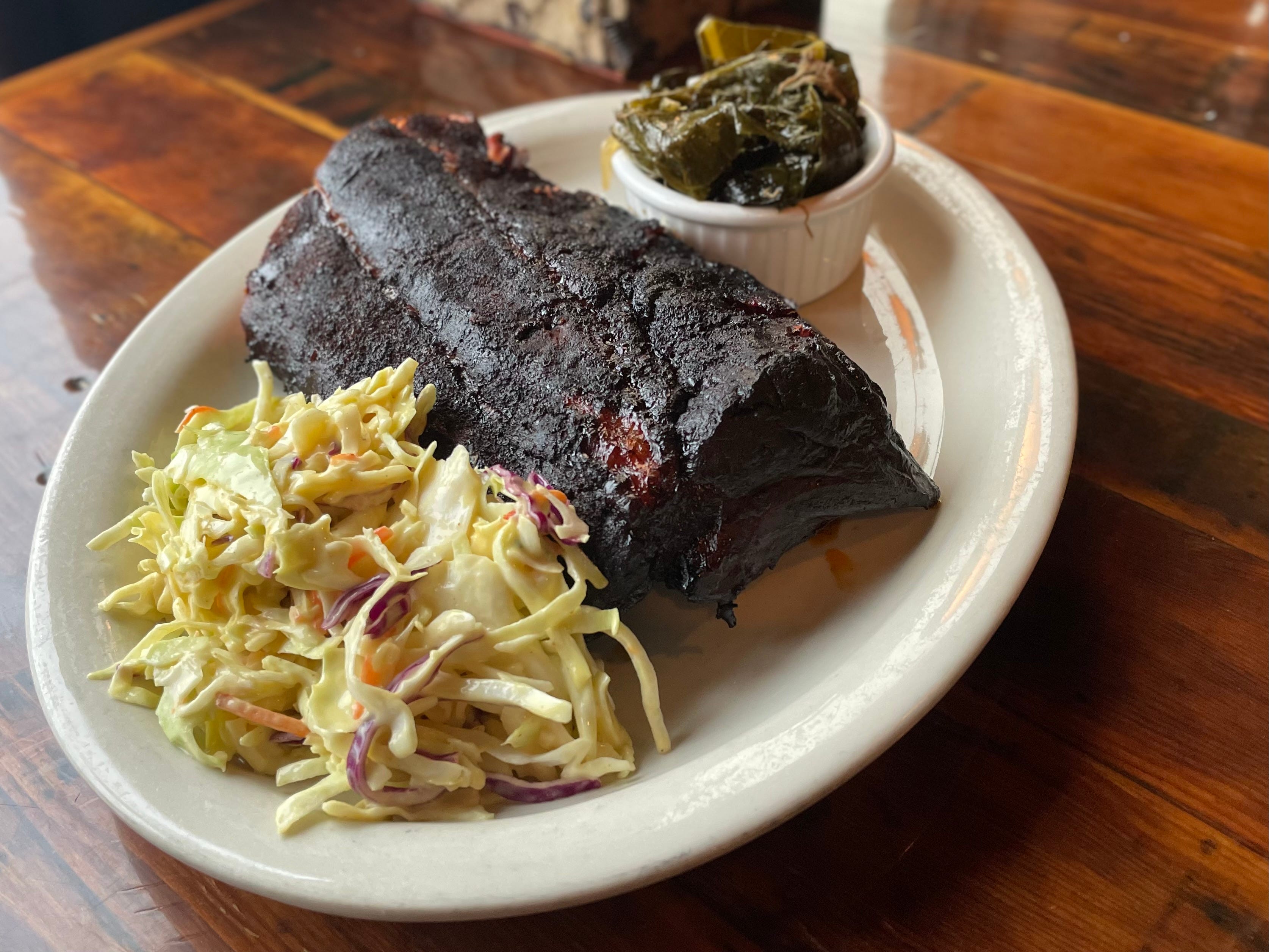 Ribs with coleslaw and collard greens at Flying Mango in Beaverdale