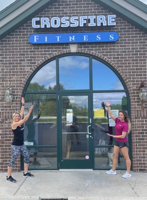 Angel Van Noie, left, and Jenny Conley want their new business, CrossFire Fitness in Hobart, to feel like a community.