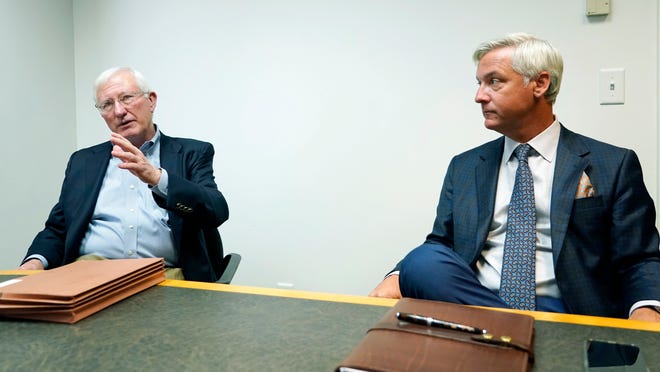 Former Mississippi Gov. Ronnie Musgrove speaks left,, Tuesday, May 31, 2022, in Jackson, Miss., about teaming up with Quentin Whitwell, right, a healthcare executive, to apply for a state license to open a medical marijuana testing facility, Magnolia Tech Labs, in Marshall County.