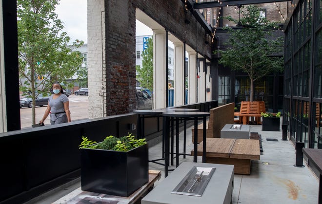 The beer garden features seating in the new Caption by Hyatt building Thursday, June 2, 2022, at 245 South Front Street in Memphis. The hotel officially opens at the end of June. 