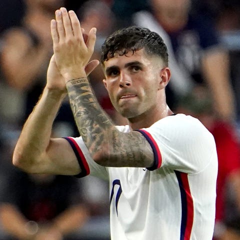 Christian Pulisic recognizes the crowd as he is su