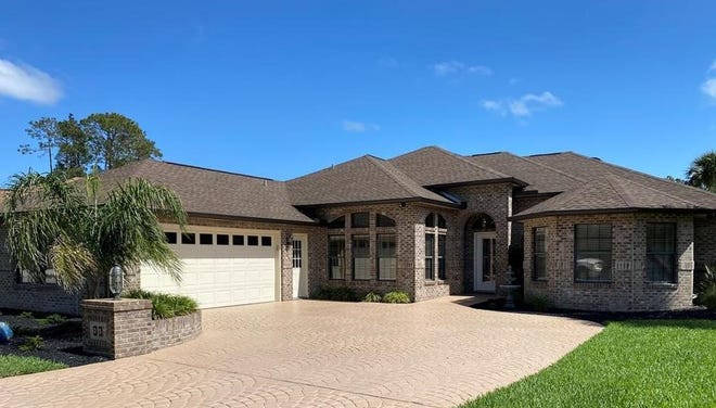 Built in 1992 on the Cypress Knoll Golf Course, this Elder Drive home has three bedrooms and three baths in 2,251 square feet of living space. It also has skylights, and a heated and screened pool, and it sold recently fof $616,000.