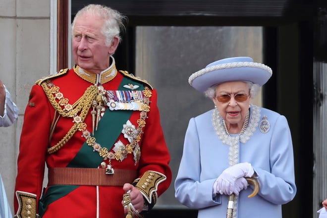 Britain's Prince Charles and Queen Elizabeth II, watch the Trooping of the Color in London, Thursday June 2, 2022.