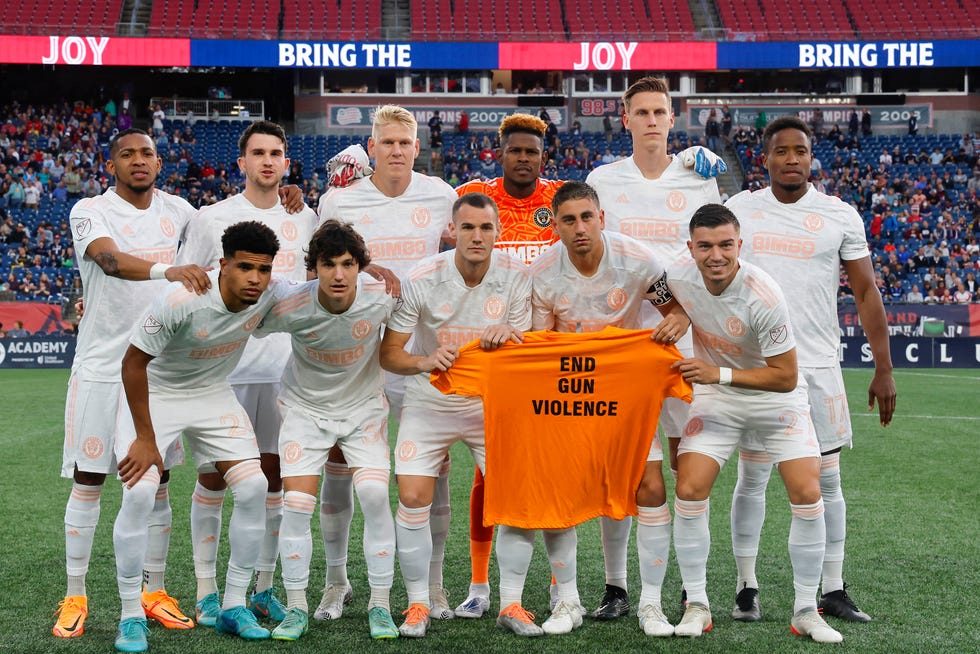 May 28, 2022; Foxborough, Massachusetts, USA; The Philadelphia Union pose with a tee-shirt to end gun violence before their game against the New England Revolution at Gillette Stadium. Mandatory Credit: Winslow Townson-USA TODAY Sports