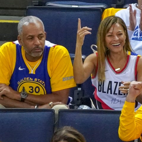 Dell and Sonya Curry watch a playoff game between 