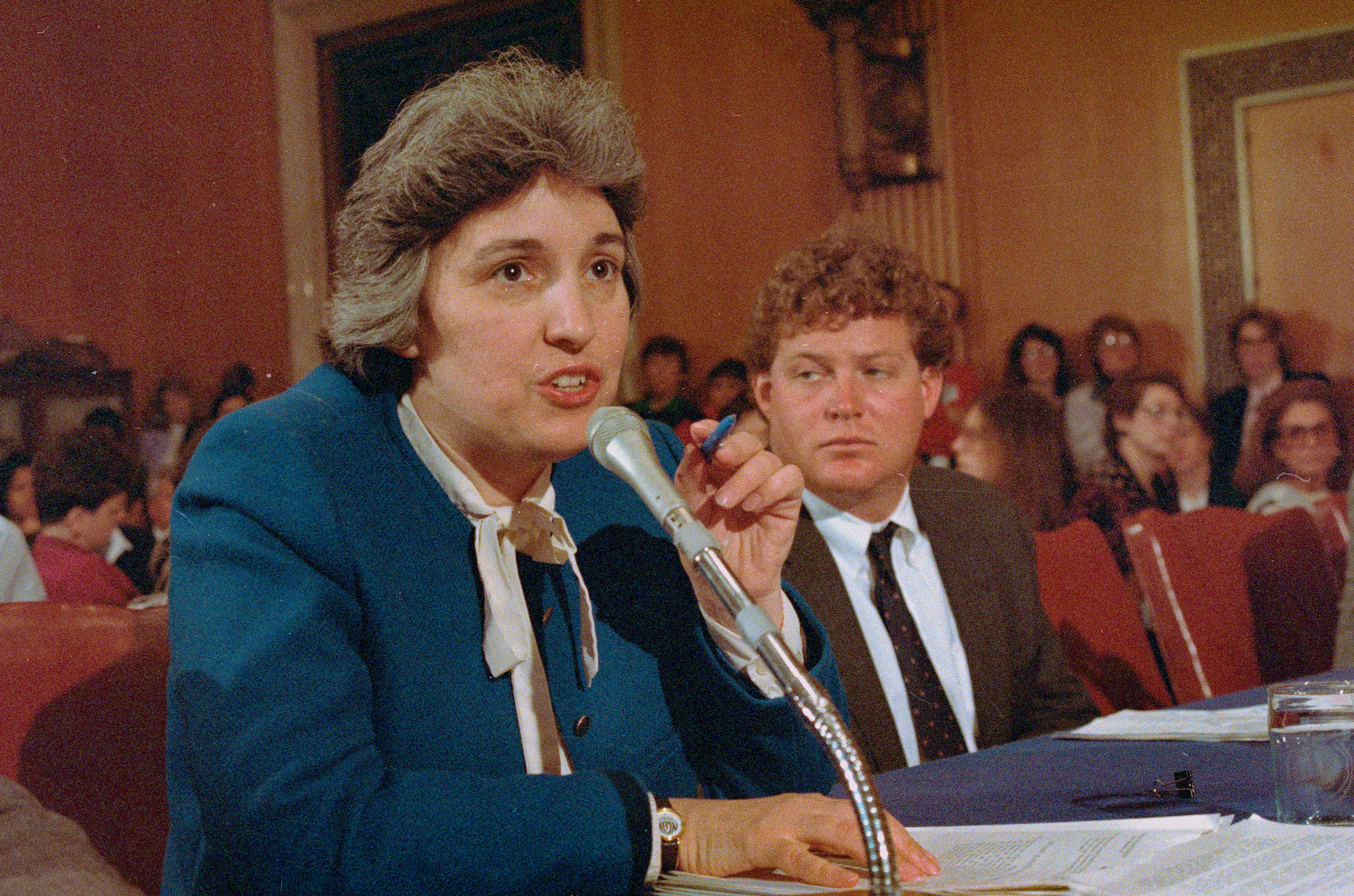 Eleanor Smeal, president of the National Organization of Women, and Edward Kennedy Jr, appear before the Senate Labor and Human Resources Committee on March 19, 1987 to testify in favor of the Civil Rights Restoration Act of 1987.